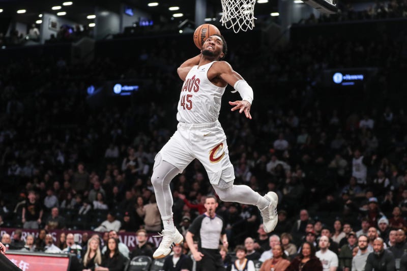 Cleveland Cavaliers guard Donovan Mitchell (45) goes up for a dunk in the first quarter against the Brooklyn Nets at Barclays Center. 