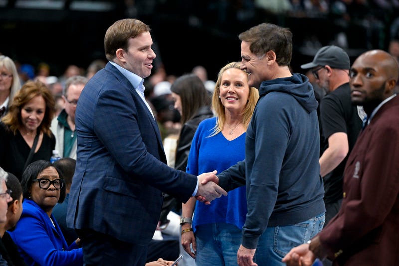 Dallas Mavericks governor Patrick Dumont (left) talks with Mark Cuban (right) during the first quarter of the game between the Mavericks and the Washington Wizards at the American Airlines Center.
