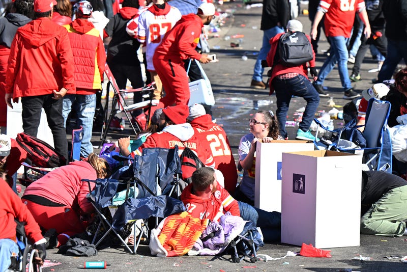 Fans take cover during shooting at Kansas City Chiefs Super Bowl celebration