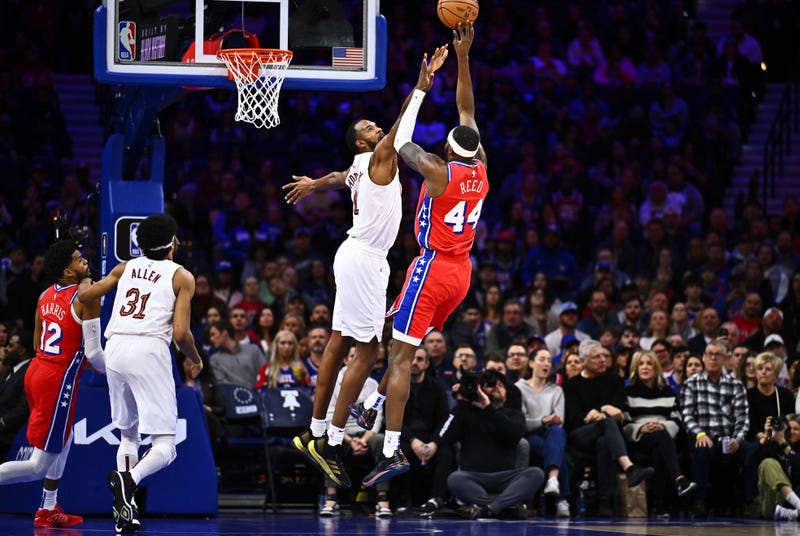 Philadelphia 76ers forward Paul Reed (44) shoots against Cleveland Cavaliers center Evan Mobley (4) in the first quarter at Wells Fargo Center.