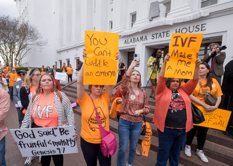 Families concerned with in vitro fertilization legislation gather for a protest rally at the Alabama Statehouse in Montgomery, Ala.