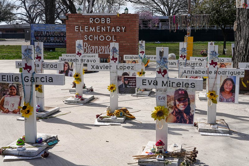 Crosses dedicated to the 21 victims of the 2022 mass shooting at Robb Elementary are placed in front of the school on Monday, February 26, 2024, in Uvalde, Texas.