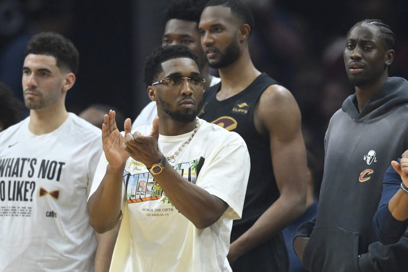 Cleveland Cavaliers guard Donovan Mitchell (front) reacts in the second quarter against the New York Knicks at Rocket Mortgage FieldHouse.