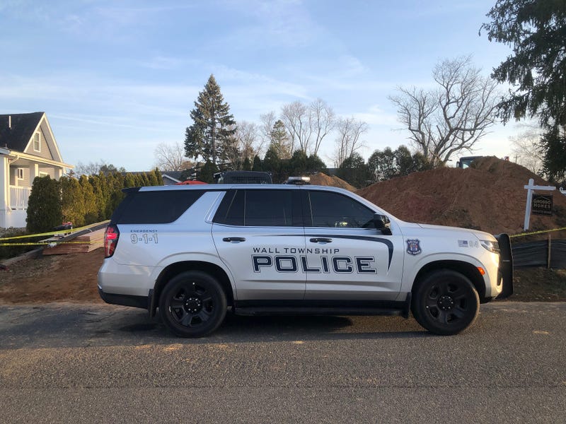 A Wall Township Police vehicle is seen by the vacant lot on March 13, 2024