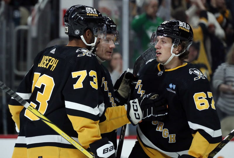 Rickard Rakell, PO Joseph, John Ludvig huddle after goal