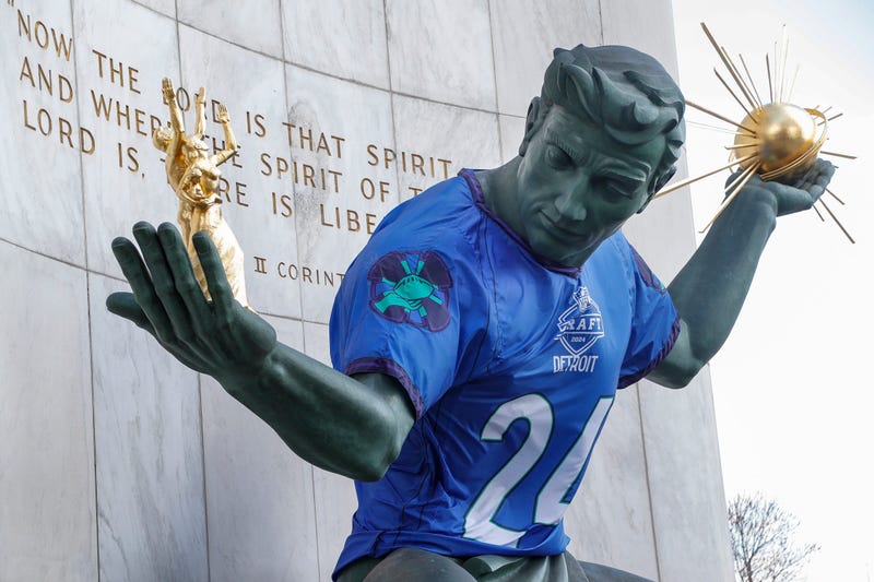 The Spirit of Detroit statue sports a jersey for the upcoming NFL Draft on Tuesday, April 16, 2024, in downtown Detroit.