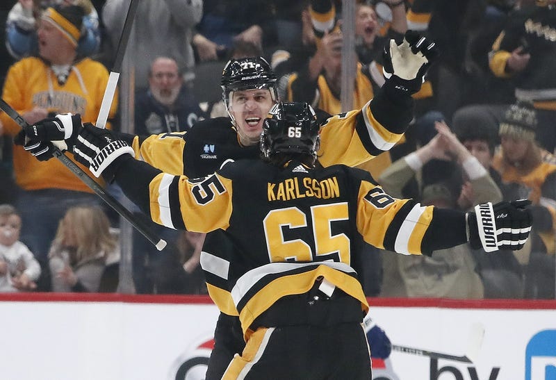 Evgeni Malkin celebrating with Evgeni Malkin