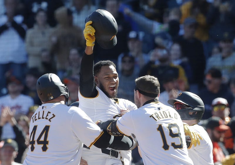 Edward Olivares celebrates after Pirates walkoff win