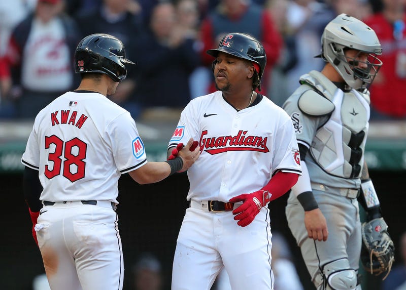 Cleveland Guardians third baseman Jose Ramirez (11) celebrates with Cleveland Guardians outfielder Steven Kwan (38) at home after his two-run homer during the fifth inning of the Cleveland Guardians' home opener against the Chicago White Sox, Monday, April 8, 2024, in Cleveland, Ohio.