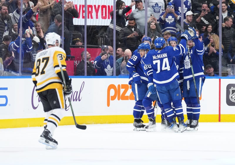 Sidney Crosby watching as Toronto celebrates