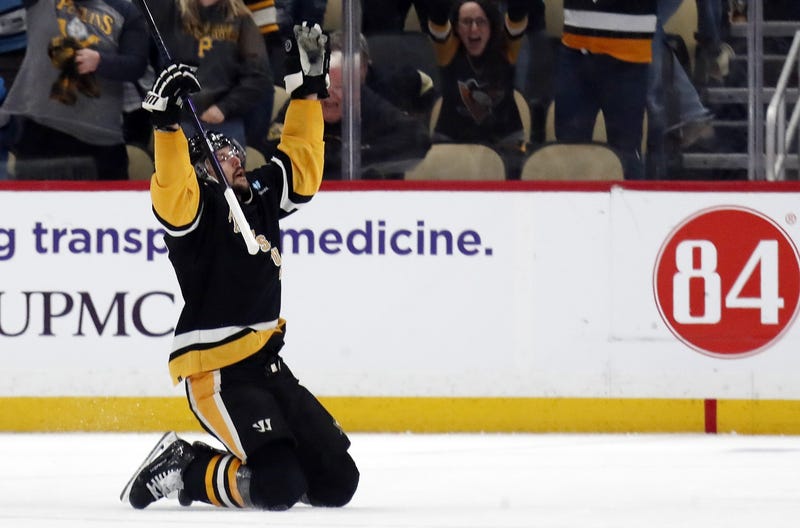 Erik Karlsson celebrates OT winner