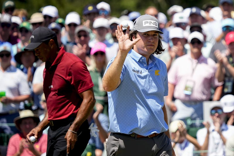 Neal Shipley plays with Tiger Woods