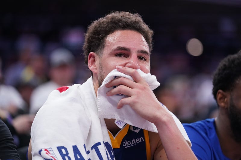 Apr 16, 2024; Sacramento, California, USA; Golden State Warriors guard Klay Thompson (11) sits on the bench during action against the Sacramento Kings in the fourth quarter during a play-in game of the 2024 NBA playoffs at the Golden 1 Center