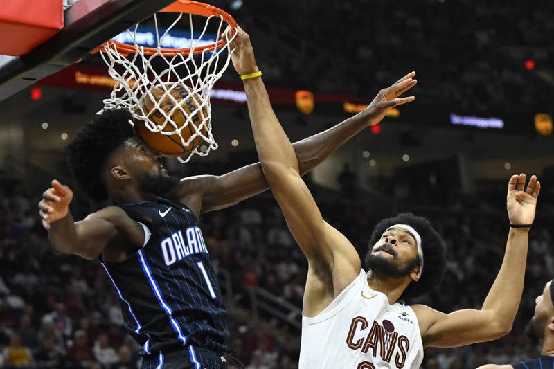Cleveland Cavaliers center Jarrett Allen (31) dunks beside Orlando Magic forward Jonathan Isaac (1) during a game of the first round for the 2024 NBA playoffs at Rocket Mortgage FieldHouse.
