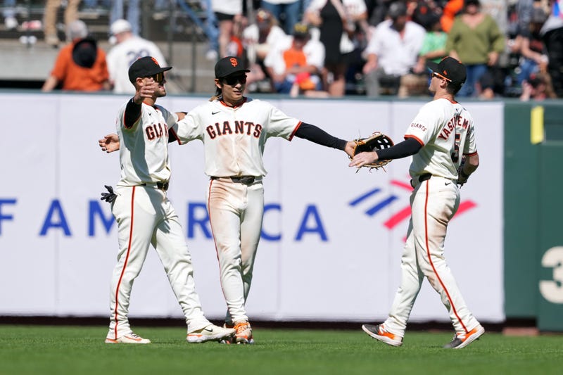 Apr 20, 2024; San Francisco, California, USA; San Francisco Giants center fielder Jung Hoo Lee (center) celebrates with left fielder Michael Conforto (left) and right fielder Mike Yastrzemski (right) after defeating the Arizona Diamondbacks at Oracle Park.