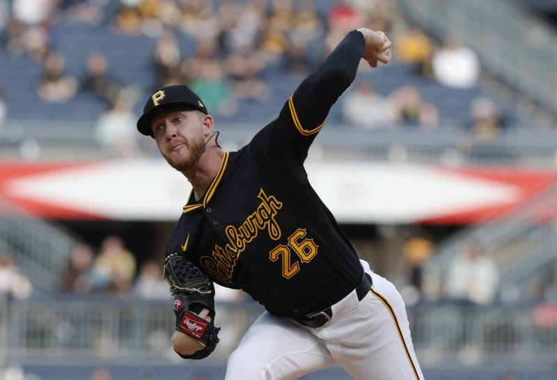 Bailey Falter throwing vs. Milwaukee at home