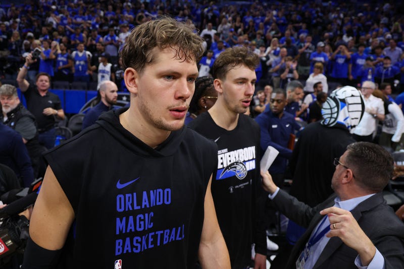Orlando Magic forward Franz Wagner (22) and center Moritz Wagner (21) celebrate after beating the Cleveland Cavaliers during game four of the first round for the 2024 NBA playoffs at Kia Center. 