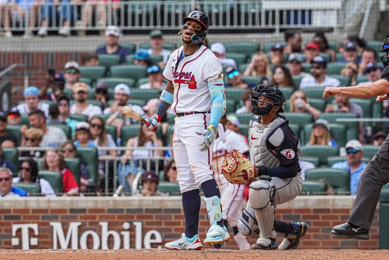 Atlanta Braves right fielder Ronald Acuna Jr (13) reacts after being called out on strikes against the Cleveland Guardians during the ninth inning at Truist Park.