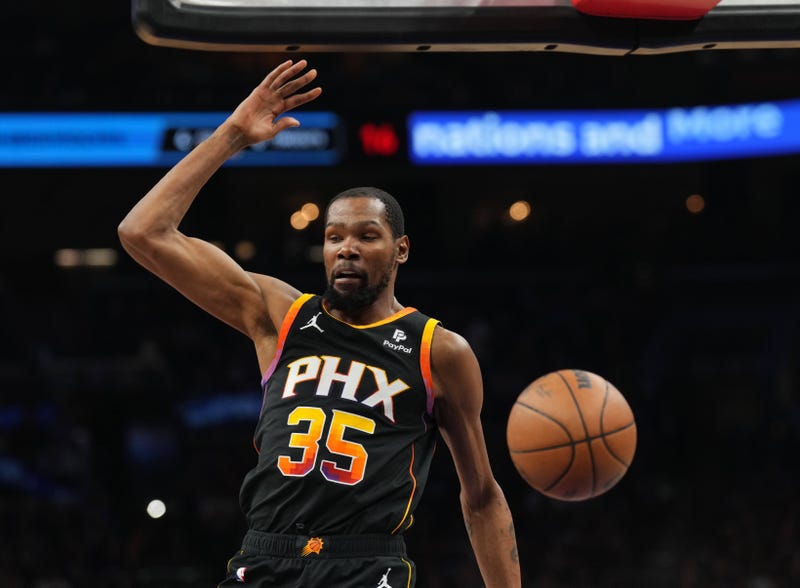 Apr 28, 2024; Phoenix, Arizona, USA; Phoenix Suns forward Kevin Durant (35) dunks against the Minnesota Timberwolves during the first half of game four of the first round for the 2024 NBA playoffs at Footprint Center. 