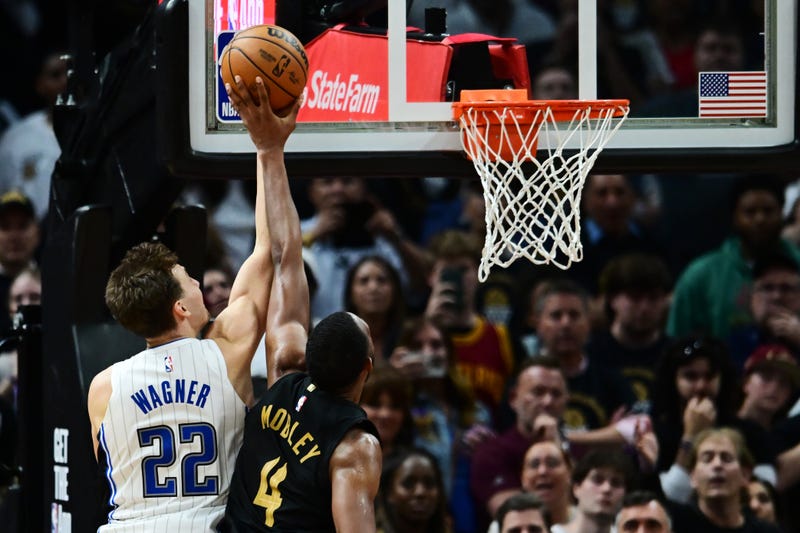 Cleveland Cavaliers forward Evan Mobley (4) blocks the shot of Orlando Magic forward Franz Wagner (22) during the fourth quarter in game five of the first round for the 2024 NBA playoffs at Rocket Mortgage FieldHouse.