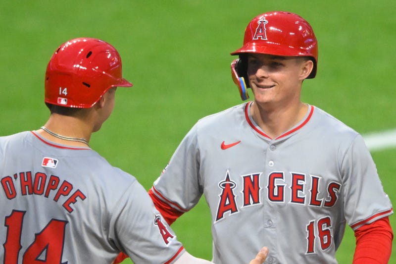 Los Angeles Angels center fielder Mickey Moniak (16) celebrates his three-run home run with catcher Logan O'Hoppe (14) in the fourth inning against the Cleveland Guardians at Progressive Field. 