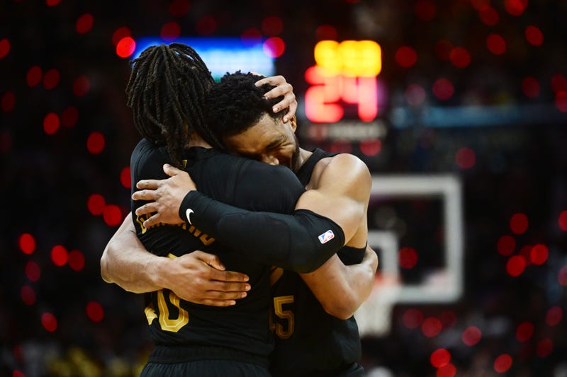 Cleveland Cavaliers guard Donovan Mitchell (45) celebrates with guard Darius Garland (10) after Garland hit a three point basket during the second half against the Orlando Magic in game seven of the first round for the 2024 NBA playoffs at Rocket Mortgage FieldHouse.