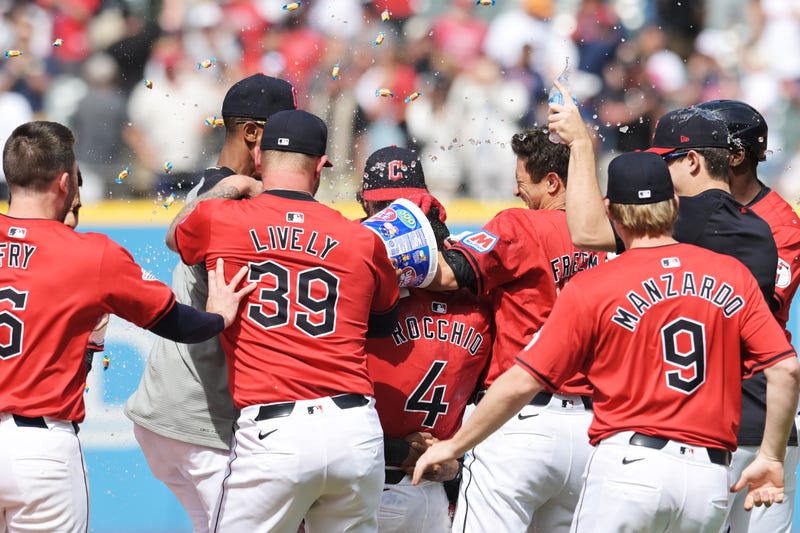 Cleveland Guardians shortstop Brayan Rocchio (4) celebrates with teammates after hitting a game winning RBI single during the tenth inning Detroit Tigers at Progressive Field.