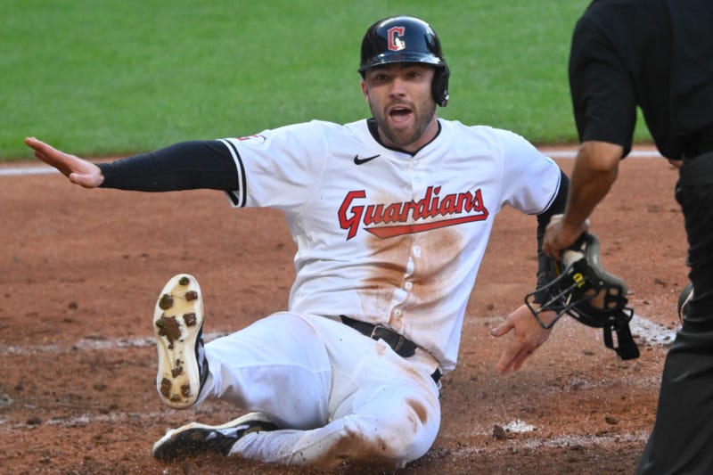 Cleveland Guardians left fielder David Fry (6) scores a run in the fifth inning against the Minnesota Twins at Progressive Field. 