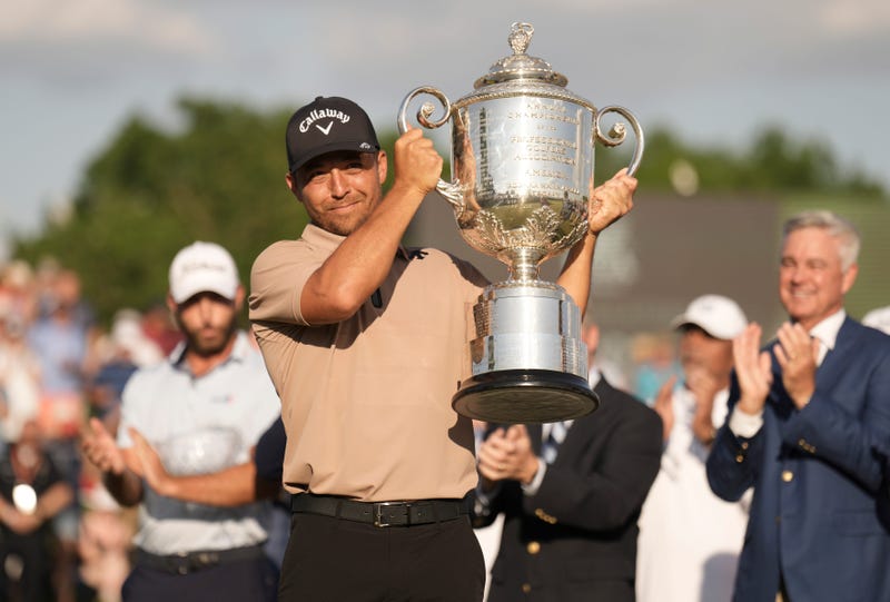 Xander Schauffele holds up the Wanamaker Trophy after winning the 2024 PGA Championship at Valhalla Golf Club May 19, 2024
