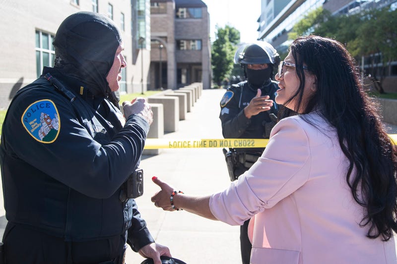 U.S. Rep. Rashida Tlaib talks to Wayne State police