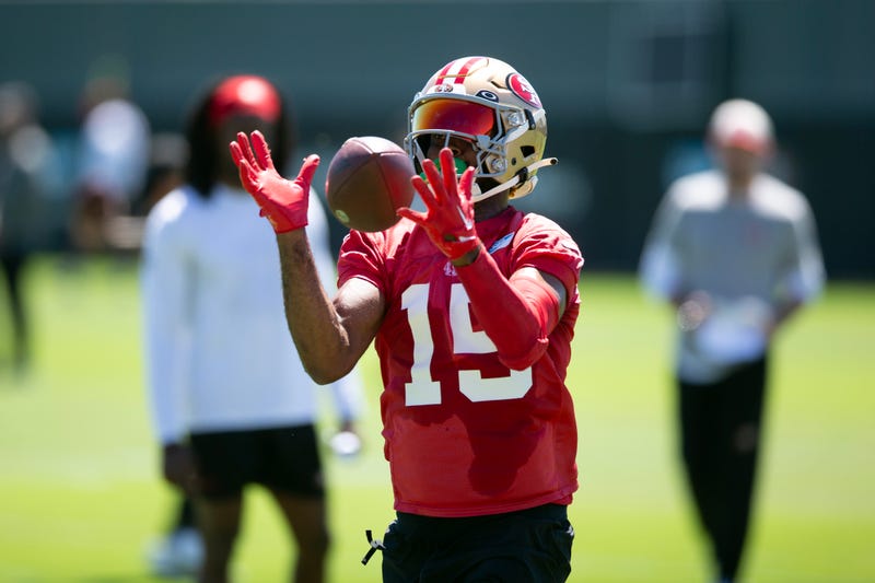 San Francisco 49ers wide receiver Jauan Jennings (15) catches a pass during a mandatory minicamp at the team’s headquarters. 