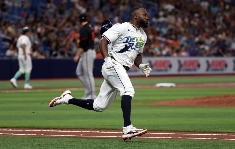 Tampa Bay Rays outfielder Randy Arozarena (56) hits an RBI double against the Baltimore Orioles during the third inning at Tropicana Field.