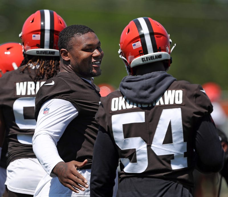 Browns defensive tackle Mike Hall Jr. (51) chats with defensive end Ogbo Okoronkwo during minicamp, Wednesday, June 12, 2024, in Berea.