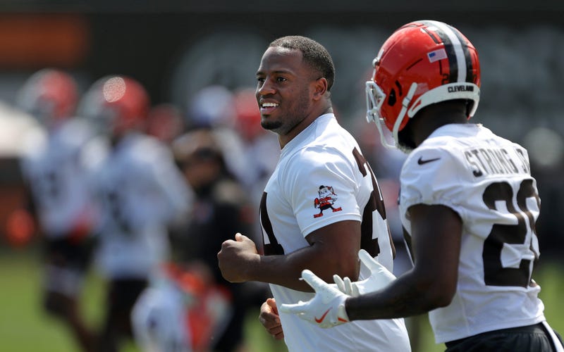 Browns running backs Nick Chubb (left) and Pierre Strong Jr. jog the field during minicamp in Berea.