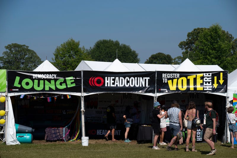 HeadCount volunteers register future voters at Bonnaroo in Manchester, Tennessee on June 14, 2024.