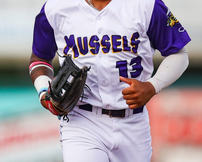 Mighty Mussels catcher Derek Bender was released by club after the organization found he tipped pitches to opposing batters in a game.