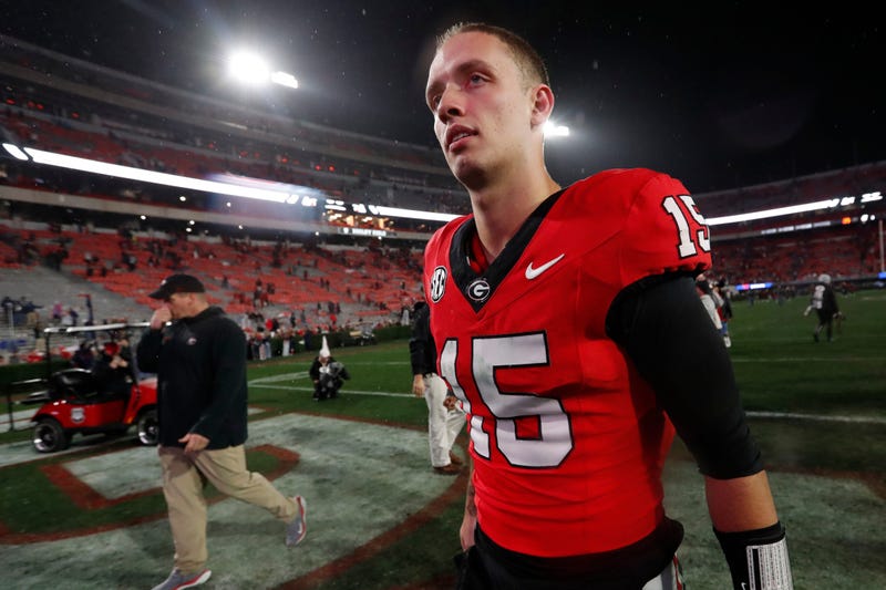 Georgia quarterback Carson Beck (15) heads to the locker room after wining a NCAA college football game against Ole Miss in Athens, Ga., on Saturday, Nov. 11, 2023. Georgia won 52-17.
