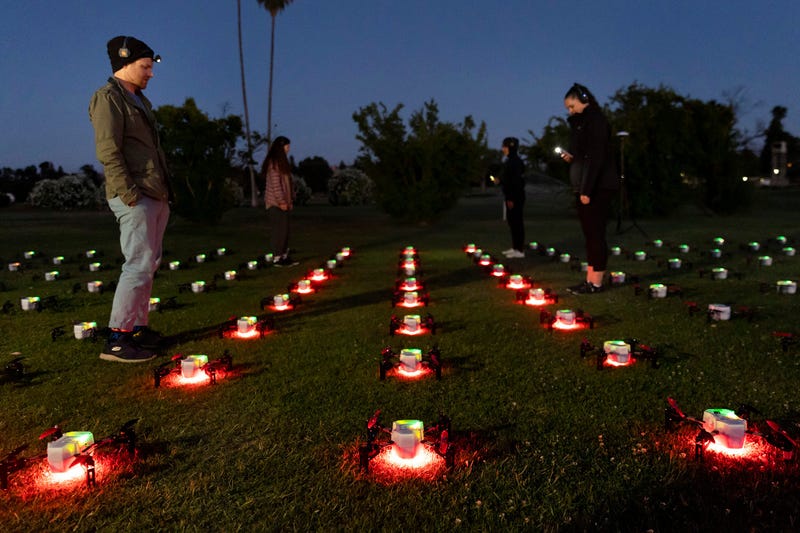 Crew members with Sky Elements do an “arms check” to ensure all of the 200 drones’ rotors are functioning properly prior to a drone show at the Alameda County Fair on June 26, 2024 in Pleasanton, Calif