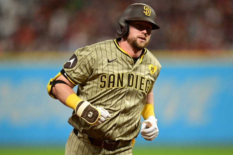 San Diego Padres designated hitter Jake Cronenworth (9) rounds the bases after hitting a home run during the eighth inning against the Cleveland Guardians at Progressive Field.