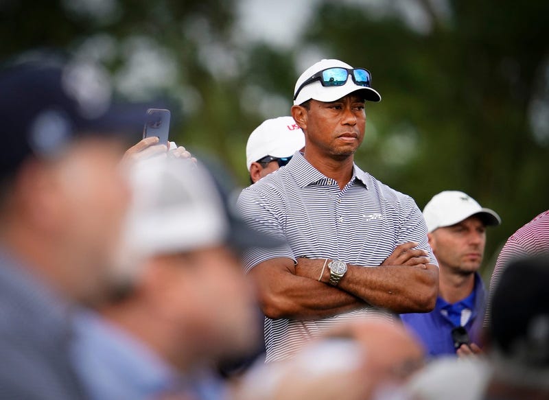 Tiger Woods watches his son Charlie tee off from No. 1 on the North Course during the 76th U.S. Junior Amateur Championship at Oakland Hills Country Club in Bloomfield Hills on Monday, July 22, 2024.