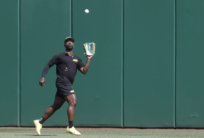 Andrew McCutchen shagging balls in right