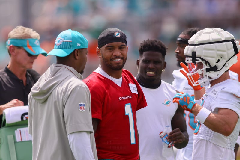 Miami Dolphins quarterback Tua Tagovailoa (1) looks on during training camp at Baptist Health Training Complex.