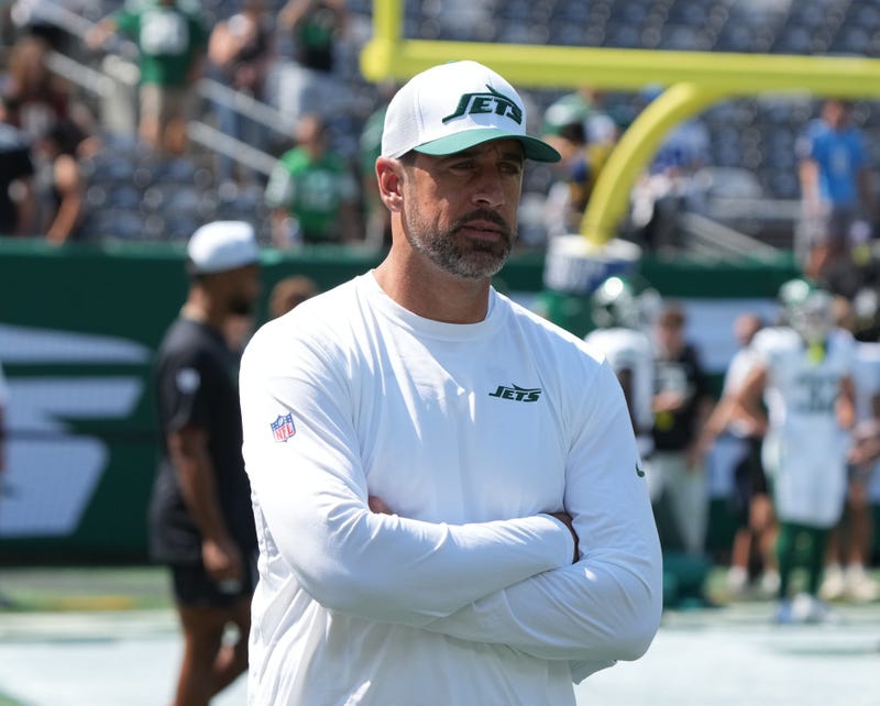 Aaron Rodgers, who wasn't dressed to play, during pre game warm ups as the Washington Commanders came to MetLife Stadium to play the New York Jets in the first preseason game of the 2024 season.