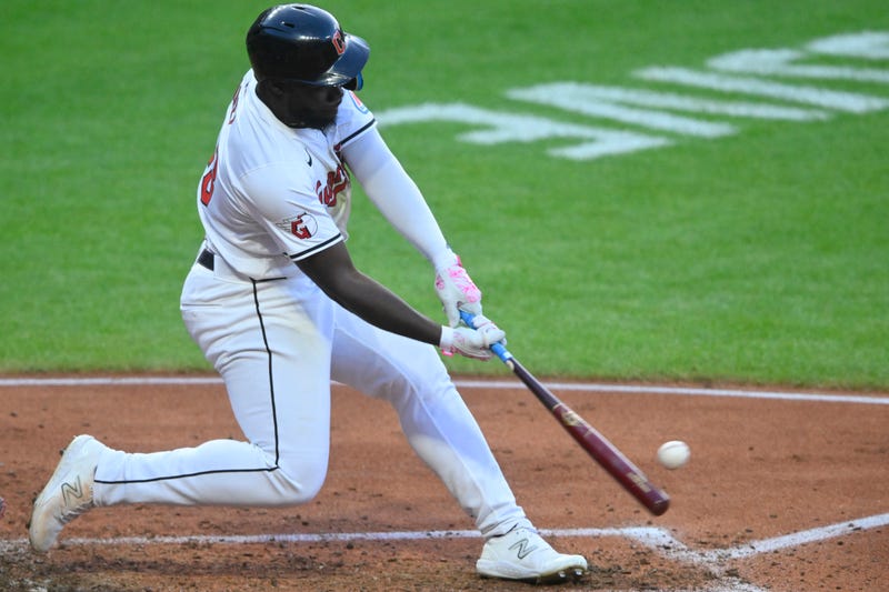 Aug 14, 2024; Cleveland, Ohio, USA; Cleveland Guardians right fielder Jhonkensy Noel (43) hits a three-run home run in the fourth inning against the Chicago Cubs at Progressive Field.