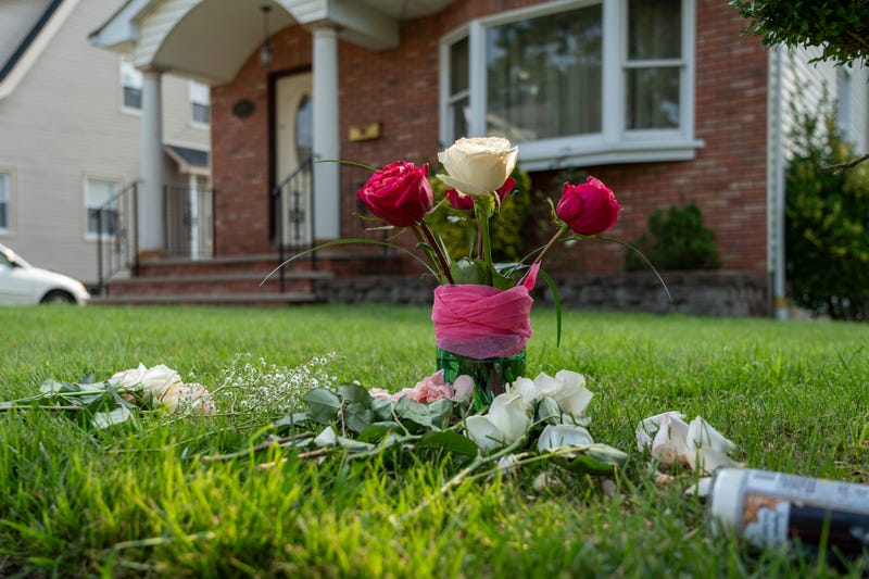 Flowers are placed outside the home of 26-year-old Naomi Hagley following a fatal shooting on Hickory Street in Teaneck on Friday, August 16, 2024