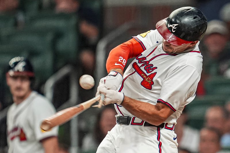 Atlanta Braves first baseman Matt Olson (28) breaks his bat while grounding into a fielders choice against the Philadelphia Phillies during the eighth inning at Truist Park.