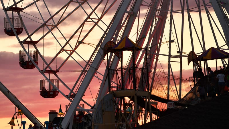 Boardwalk visitors ride the Ferris wheel at Gillian's Wonderland Pier in Ocean City.