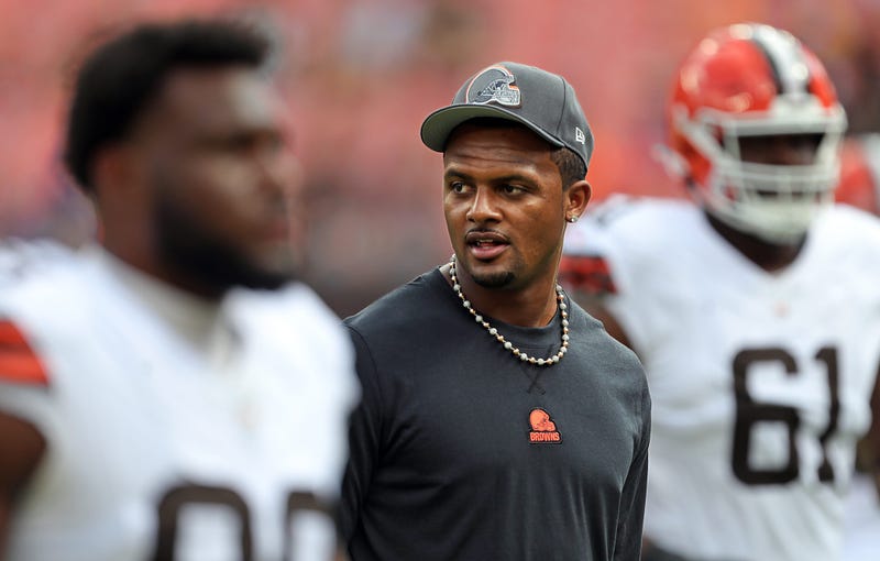 Cleveland Browns quarterback Deshaun Watson, center, walks back to the locker room before an NFL preseason football game against the Minnesota Vikings at Cleveland Browns Stadium, Saturday, Aug. 17, 2024, in Cleveland, Ohio.