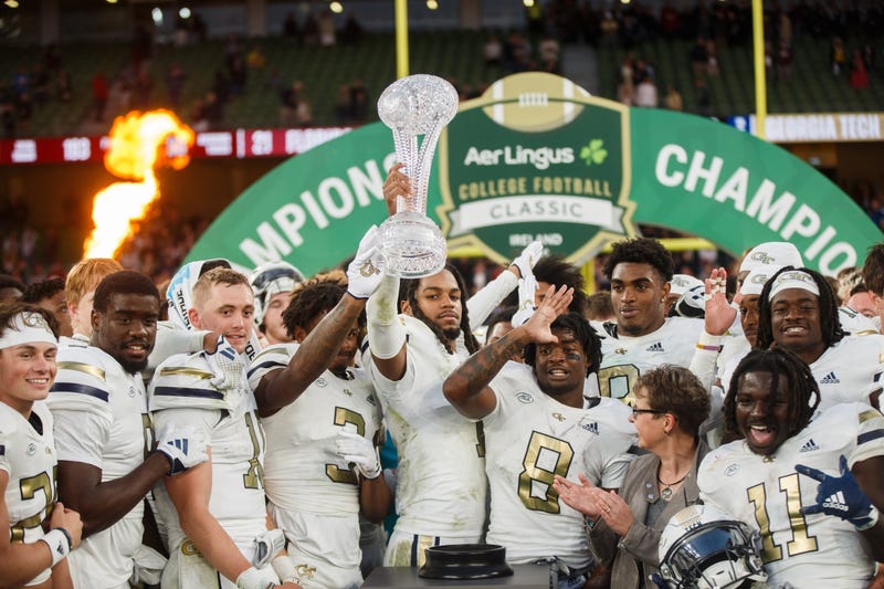 Aug 24, 2024; Dublin, IRL; Georgia Tech celebrate their win against Florida State at Aviva Stadium. Mandatory Credit: Tom Maher/INPHO via USA TODAY Sports
