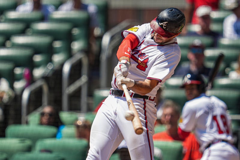 Atlanta Braves first baseman Matt Olson (28) hits a home run against the Washington Nationals during the sixth inning at Truist Park.